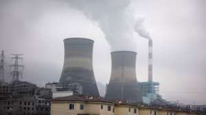epa11097908 A coal power plant along the mountains in Tangfang Town of Zhenxiong County, Yunnan province southwest of China, 23 January 2024. Chinese state media reported at least 20 dead and 24 missing after a landslide hit Liangshui Village in China's southwest province of Yunnan early morning on 22 January, with 18 homes buried and more than 500 people evacuated.  EPA/MARK R. CRISTINO