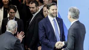 epa11895828 US Vice President JD Vance (2-R) and Munich Security Conference Chairman Christoph Heusgen (R) shake hands as they talk during the 61st Munich Security Conference (MSC), in Munich, Germany, 14 February 2025. High-level international decision-makers meet at the 61st Munich Security Conference in Munich from 14 to 16 February 2025 during their annual meeting to discuss global security issues.  EPA/RONALD WITTEK