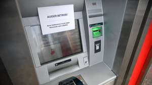 epa07258421 An information leaflet indicates an empty ATM in Oberhausen, Germany, 02 January 2019. The service union Verdi has called on the 12,000 employees of the cash transports to strike which is expected to disrupt the cash flow in Germany.  EPA/SASCHA STEINBACH