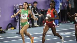 epa11977528 Patricia Silva (L) of Portugal and Lilian Odira of Kenya cross the finish line in the Women’s 800m heat at the World Athletics Indoor Championships in Nanjing, China, 21 March 2025.  EPA/ANDRES MARTINEZ CASARES