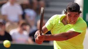 epa12147224 Henrique Rocha of Portugal in action during his Men's 3rd round match against Alexander Bublik of Kazakhstan at the French Open Grand Slam tennis tournament at Roland Garros in Paris, France, 31 May 2025.  EPA/TERESA SUAREZ