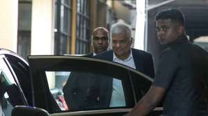 epa12059928 Former Sri Lankan President Ranil Wickremesinghe (C) leaves the Commission to Investigate Allegations of Bribery or Corruption, after giving a statement related to an ongoing investigation under the Anti-Corruption Act, in Colombo, Sri Lanka, 28 April 2025. The former president was summoned over a statement he allegedly made concerning MP Chamara Sampath Dassanayake, who was earlier arrested and brought before the courts under the Anti-Corruption Act.  EPA/CHAMILA KARUNARATHNE