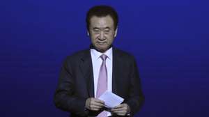 epa06698351 Wang Jianlin, CEO of the Dalian Wanda Group, attends the opening ceremony of Wanda Oriental Movie Metropolis in Qingdao, Shandong province, China, 28 April 2018. Wanda Qingdao Oriental Movie Metropolis opens on 28 April 2018 which is a major Chinese studio, combining film and television production and several other facilities which was funded by Wang Jianlin, CEO of the Dalian Wanda Group. Starting construction on 22 September 2013 with the total investment of 50 billion RMB yuan (around 6.5 billion Euros), it has the world's largest studio pavilion of 10,000 square meters, featuring some of the world's largest and most technologically-advanced facilities.  EPA/WU HONG