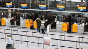 epa11084880 A man checks in at the Lufthansa desk at Munich Airport in Munich, Germany, 17 January 2024. Slippery conditions due to freezing rain and ice formation cause traffic problems in large parts of Germany. Numerous flights are canceled and the railroads are also expecting restrictions.  EPA/ANNA SZILAGYI