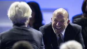 epa12667635 President of the European Central Bank Christine Lagarde (L) shakes hands with US Secretary of Commerce Howard Lutnick (R) at the 56th annual meeting of the World Economic Forum (WEF) in Davos, Switzerland, 21 January 2026. The meeting under the topic 'A Spirit of Dialogue' brings together entrepreneurs, scientists, and corporate and political leaders in Davos and takes place from 19 to 23 January in Davos.  EPA/GIAN EHRENZELLER
