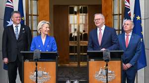 epa12845106 Australian Prime Minister Anthony Albanese (R) and President of the European Commission Ursula von der Leyen (L) speak to the media during a press conference at Parliament House in Canberra, Australia, March 24, 2026.  EPA/LUKAS COCH AUSTRALIA AND NEW ZEALAND OUT