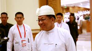epa12879747 Former military chief and Myanmar president Min Aung Hlaing (R) talks to members of the media after the swearing in ceremony at the Union parliament in Naypyitaw, Myanmar, 10 April 2026. Min Aung Hlaing secured a parliamentary vote on 03 April 2026 to take over as the country’s president, five years after he ousted Aung San Suu Kyi’s elected government in 2021.  EPA/KO THURA