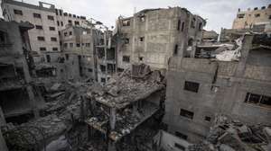 epa12942845 The ruins of a destroyed building after an Israeli airstrike in the Al-Shati refugee camp, west of Gaza City, Gaza Strip, 09 May 2026. The overnight attack targeted the building following Israeli army warnings for residents to evacuate immediately.  EPA/MOHAMMED SABER