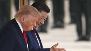 epa12955738 Chinese President Xi Jinping and U.S. President Donald Trump attend a welcome ceremony at the Great Hall of the People in Beijing, China, 14 May 2026.  EPA/Maxim Shemetov / POOL