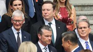 epa12955856 Apple CEO Tim Cook (L), Tesla CEO Elon Musk (C), U.S. Defense Secretary Pete Hegseth (3-R) and U.S. Treasury Secretary Scott Bessent (R) attend the welcome ceremony for U.S. President Donald Trump by Chinese President Xi Jinping, at the Great Hall of the People in Beijing, China, 14 May 2026. US President Trump is in Beijing for a high-stakes state visit running through 15 May, marking his first return to the mainland since 2017.  EPA/MAXIM SHEMETOV / POOL