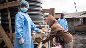 epa12997425 Locals wash their hands at a checkpoint set up for preventive measures against the spread of Ebola in Kanyaruchinya, near Goma, North Kivu, Democratic Republic of Congo, 27 May 2026. The World Health Organization (WHO) has declared the Ebola outbreak, caused by the Bundibugyo virus, in the Democratic Republic of the Congo a public health emergency of international concern.  EPA/MARIE JEANNE MUNYERENKANA