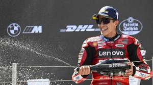 epa13022158 First placed Ducati Lenovo rider Marc Marquez of Spain celebrates on the podium after the MotoGP race of the Motorcycling Grand Prix of Hungary at the Balaton Park Circuit in Balatonfokajar, Hungary, 07 June 2026.  EPA/Boglarka Bodnar HUNGARY OUT