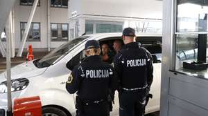 epa10930327 Slovenian police officers check vehicles at the Obrezje-Bregana border between Slovenia and Croatia crossing near Obrezje village, Slovenia, 21 October 2023. On 21 October, Ljubljana temporarily reinstated traffic controls along its border sections shared with Croatia and Hungary, justifying the measures as part of necessary steps to tighten national security against potential terrorist attacks and to curb the increased illegal migration coming from the Middle East.  EPA/ANTONIO BAT