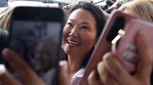 epa13031221 Right-wing presidential candidate Keiko Fujimori arrives at a press conference in Lima, Peru, 11 June 2026. Fujimori said she would wait for the final vote count from the National Office of Electoral Processes (ONPE) before making a statement.  EPA/Paolo Aguilar