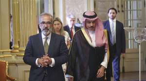 Portuguese Minister of State and Foreign Affairs, Paulo Rangel (L) flanked by his counterpart of Saudi Arabia, Faisal bin Farhan Al Saud (C) arrives to attend a joint statement to journalists after a meeting at Necessidades Palace, in Lisbon, Portugal, 16 June 2026. ANTONIO PEDRO SANTOS/LUSA