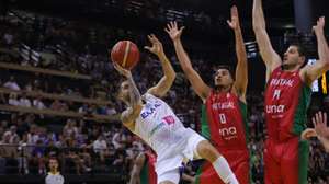 epa13089422 Vasileios Toliopoulos (L) of Greece and Diogo Brito (C) of Portugal in action during the FIBA Basketball World Cup 2027 European Qualifiers match between Greece and Portugal, in Athens, Greece, 05 July 2026.  EPA/PETE ANDREOU