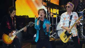 epaselect epa10104472 (L-R) Guitarist Ronnie Wood, lead vocalist Mick Jagger, and guitarist Keith Richards of the British band The Rolling Stones perform, at the Waldbuehne concert venue, in Berlin, Germany, 03 August 2022. The Stones already played venues in Munich and Gelsenkirchen during their 'Sixty' jubilee tour.  EPA/CLEMENS BILAN