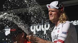 Danish rider Julius Johansen of UAE team Emirates - XRG celebrates in the podium after the fifth stage of the 87th Portugal Cycling Tour cycling race a individual time trial over 17,4 km, from Anadia to Águeda, Portugal, 10 August 2026. NUNO VEIGA/LUSA