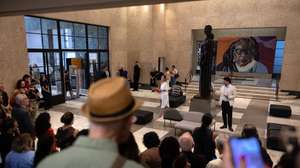 epa12910180 People watch a performance during a ceremony to unveil the restored statue of Miguel de Cervantes at the Mario de Andrade Public Library in Sao Paulo, Brazil, 23 April 2026. The monument, commissioned by the Spanish community, was created by Brazilian sculptor Raphael Galvez and originally inaugurated in 1947.  EPA/ISAAC FONTANA