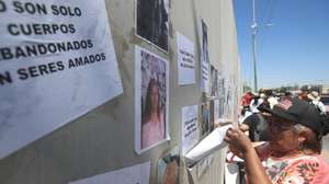 epa12280467 Relatives of victims participate in a protest in front of the State Attorney General's Office in Ciudad Juarez, Mexico, 02 August 2025. Relatives of the hundreds of people whose bodies were found piled up in a crematorium in Ciudad Juarez, on the border in northern Mexico, protested to demand justice, transparency in the investigations, and dignified treatment for their loved ones.  EPA/Luis Torres