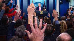 epa12665698 Journalists try to ask US President Donald J. Trump questions as he joins the White House briefing in the James S Brady Press Briefing Room of the White House in Washington, DC, USA, 20 January 2026, which marks the one-year anniversary of the president taking office for his second term.  EPA/Aaron Schwartz / POOL