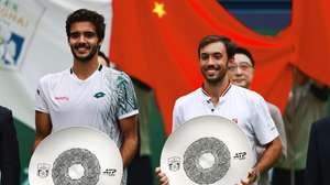 epa13312996 Francisco Cabral (L) of Portugal and JJ Tracy (R) of USA  pose with their runner-up trophies after losing their Men's Double final match against Lucas Miedler of Austria and Neil Oberleitner of Austria at the Shanghai Masters tennis tournament in Shanghai, China, 18 October 2026.  EPA/ALEX PLAVEVSKI