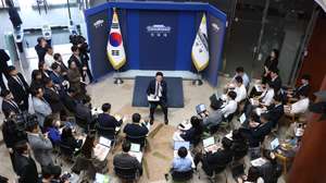 epa13314901 South Korean President Lee Jae Myung (C, rear) attends a press conference with reporters at the Chunchugwan press center inside the presidential compound of Cheong Wa Dae in Seoul, South Korea, 19 October 2026.  EPA/YONHAP / POOL SOUTH KOREA OUT