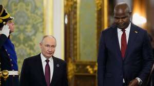 epa13335031 Russian President Vladimir Putin (C) and Mozambique's President Daniel Chapo enter a hall for their talks on the sidelines of the 8th Gas Exporting Countries Forum (GECF) Summit in Moscow, Russia, 27 October 2026. The summit brings together heads of state and government from GECF member countries.  EPA/PAVEL BEDNYAKOV / POOL