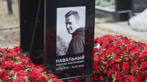 epaselect epa11892214 Floral tributes and a portrait are seen at the grave of late Russian opposition leader Alexei Navalny at the Borisovskoye cemetery, in Moscow, Russia, 13 February 2025. Navalny died aged 47 in an arctic penal colony on 16 February 2024, after being transferred there in 2023. The colony is considered to be one of the world's harshest prisons. Alexei Navalny's body was laid to rest on 01 March 2024 at the Borisovskoye cemetery in Moscow.  EPA/MAXIM SHIPENKOV