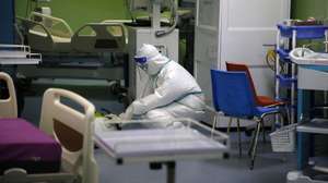 epa09417002 An agent of the National Institute of Public Hygiene (INHP) wearing personal protective equipment (PPE) suit disinfects the premises of the CHU hospital of Cocody after a case of the Ebola virus was confirmed, in Abidjan, Cote d'Ivoire, 16 August 2021. Ivorian ministry of health confirmed on 14 August a patient tested positive with the Ebola virus after travelling to Abidjan from the neighboring Guinea, the first Ebola case reported in the Ivory Coast in 25 years. Health authorities began disinfecting the premises of the Cocody hospital, where the patient was first admitted, and vaccinating health workers against Ebola.  EPA/LEGNAN KOULA