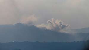 epa13005491 Smoke rises as a result of an Israeli strike in the south of Lebanon as seen from the Israeli side of the border in the Upper Galilee, northern Israel, 30 May 2026, amid a ceasefire between Israel and Lebanon.  EPA/ATEF SAFADI
