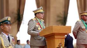 epa12859708 A handout picture made available by the Myanmar military information team shows outgoing Myanmar military Commander-in-Chief Senior General Min Aung Hlaing (C) delivering a speech as newly appointed military Commander-in-Chief General Ye Win Oo (R) attends during a ceremony to transfer the duties of the Myanmar military Commander-in-Chief in Naypyitaw, Myanmar, 30 March 2026. Myanmar's military chief Min Aung Hlaing was nominated for the presidency on 29 March, as parliament convened after a general election that excluded the country’s largest opposition parties.  EPA/MYANMAR MILITARY INFORMATION TEAM HANDOUT  HANDOUT EDITORIAL USE ONLY/NO SALES