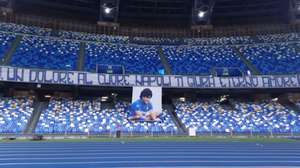 epa08851831 A banner displayed at the San Paolo stadium as a tribute to Diego Armando Maradona prior the Italian Serie A soccer match SSC Napoli vs AS Roma, Naples, Italy,  29 November 2020.  Maradona who played for Napoli died on 25 November 2020 aged 60.  EPA/CIRO FUSCO