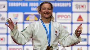 Telma Monteiro of Portugal celebrate during the medals cerimony after winning the gold medal against Kaja Kajzer of Slovenia during the final match in the woman&#039;s -57kg category at the European Judo Championships in Lisbon, Portugal, 16 April 2021. NUNO VEIGA/LUSA