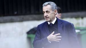 epa12469274 Former French President Nicolas Sarkozy leaves his family home the day he is due to enter prison in Paris, France, 21 October 2025. Nicolas Sarkozy will serve his five-year sentence at La Sante prison on 21 October after he was sentenced to five years in prison for receiving funds for the 2007 presidential campaign from the regime of late Libyan leader Muammar Gaddafi.  EPA/TERESA SUAREZ