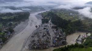 epa13219536 An aerial view of Devighat, one of the flood affected villages in Nuwakot district, Nepal, 07 September 2026. Nepal is observing a national day of mourning on 07 September on the 13th day following devastating flash floods. More than 1,200 people have been killed, and over 4,000 remain missing across northern Nepal after a glacial collapse and avalanche-triggered flash floods and mudslides along the Bhotekoshi and Trishuli river valleys near the Nepal-Tibet border, causing widespread destruction to settlements and infrastructure, according to the National Disaster Risk Reduction and Management Authority (NDRRMA).  EPA/NARENDRA SHRESTHA
