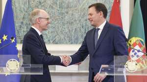 Prime Minister of Portugal Luis Montenegro (R) greets his Luxembourg counterpart Luc Frieden (L) during a press conference after their meeting at Sao Bento Palace in Lisbon, Portugal, 31 May 2024. MIGUEL A. LOPES/LUSA