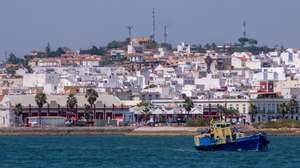 epa08543762 General view of the ferry connecting the port of Vila Real de Santo Antonio, Portugal to Ayamonte, Spain, 13 July 2020. The fluvial connection over the waters of the Guadiana river has been resumed after the cancellation of the route back in March due to the coronavirus pandemic crisis.  EPA/JuliÃ¡n PÃ©rez