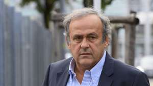 epa08636835 Former UEFA president Michel Platini walks in front of the building of the Office of the Attorney General of Switzerland, in Bern, Switzerland, 31 August 2020. Former UEFA president Michel Platini and former FIFA president Sepp Blatter each face interrogation from the Swiss public prosecutor as part of the proceedings opened in 2015 over a payment of 2 million Swiss francs. Platini's hearing is on 30 August, Blatter's hearing on 01 September.  EPA/ANTHONY ANEX