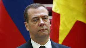 epa07176415 Russia's Prime Minister Dmitri Medvedev attends a press conference with his Vietnamese counterpart Nguyen Xuan Phuc (not pictured) at the Government Office in Hanoi, Vietnam, 19 November 2018.  EPA/KHAM / POOL
