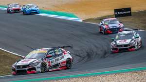 epa09305663 Portuguese driver Tiago Monteiro of ALL-INKL.DE MÃ¼nnich Motorsport team leads the peloton during Race two of the WTCR (FIA World Touring Car Cup) Race of Portugal, at Autodromo do Estoril, Portugal, 27 June 2021.  EPA/JOSE SENA GOULAO