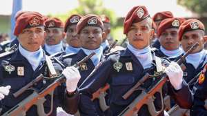epa10544993 East Timor's national police officers march during a ceremony to mark the 23rd anniversary of National Police Force or Policia Nacional de Timor-Leste (PNTL) in Dili, East Timor, also known as Timor Leste, 27 March 2023. The PNTL was formed under the United Nation before handed over to the Timor-Leste government to provide security and maintain law and order in the country.  EPA/ANTONIO DASIPARU