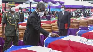 epa09070418 Equatorial Guinea vice president in charge of defense and security, Teodoro Nguema Obiang Mangue (C) attends a mass funeral for 105 victims of an explosion in Bata, Equatorial Guinea, 12 March 2021. Equatorial Guinea held a mass funeral for 105 victims killed in the blast at a military base. According to President Teodoro Obiang Nguema Mbasogo huge damage occurred when a dynamite storage facility exploded in the port city of Bata on 07 March 2021. The Equatorial Guinea government claims fires set by farmers was a contributing factor that resulted in the massive explosion of dynamite stored at a military base. Human Rights Watch (HRW) has requested an independent inquiry.  EPA/JOSE LUIS ABECARA AGUESOMO