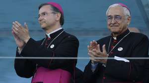 Lisbon auxiliary bishop, Americo Aguiar (L) and Leiria-Fatima bishop, D. Jose Ornelas Carvalho, attend the Stations of the Cross with the presence of Pope Francis (not pictured) on Meeting Hill at Parque Eduardo VII in Lisbon, Portugal, 04 August 2023. The Pontiff is in Portugal on the occasion of World Youth Day (WYD), one of the main events of the Church that gathers the Pope with youngsters from around the world. JOSE SENA GOULAO/LUSA/POOL