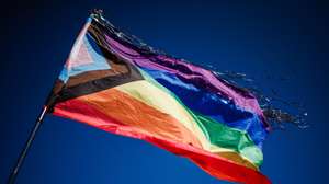 epa10852781 A pride flag waves over the memorial during a commemoration ceremony for the queer victims of the concentration camp Sachsenhausen in Oranienburg near Berlin, Germany, 10 September 2023. In 1942, hundreds of members of the the LGBT community, so-called &#039;pink triangle&#039; prisoners, of the concentration camp sub-camp &#039;Klinkerwerk Oranienburg&#039; were murdered in an assassination action. On 10 September 2023, dozens of participants commemorated the victims with speeches, music, and art performances.  EPA/CLEMENS BILAN