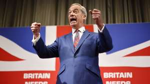 epaselect epa11379338 Honorary President of Reform UK Nigel Farage gestures while speaking at a press conference for the Reform UK party at the Glaziers Hall, London, Britain, 30 May 2024. Britain will hold a snap general election on 04 July 2024.  EPA/TOLGA AKMEN