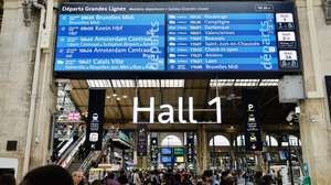 epa11496928 Stranded passengers wait inside Gare du Nord station in Paris, France, 26 July 2024. France's high speed rail network TGV was severely disrupted on 26 July following a 'massive attack', according to train operator SNCF, just hours before the opening ceremony of the Paris 2024 Olympic games. French Transport Minister Patrice Vergriete condemned 'these criminal actions' saying that they would 'seriously disrupt traffic' until this weekend. Around 800,000 passengers are expected to be affected over the weekend.  EPA/RITCHIE B. TONGO