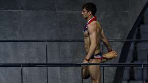 epa09400081 Tom Daley of Great Britain prepares himself before performing in the Men's 10m Platform Diving Preliminary during the Diving events of the Tokyo 2020 Olympic Games at the Tokyo Aquatics Centre in Tokyo, Japan, 06 August 2021.  EPA/PATRICK B. KRAEMER