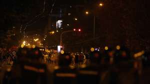 epa12308792 Protestors chant in front of riot police officers during an anti-government protest in Belgrade, Serbia, 18 August 2025. Violent clashes broke out between anti-government protesters, supporters of the ruling Serbian Progressive Party (SNS), and police.  EPA/ANDREJ CUKIC