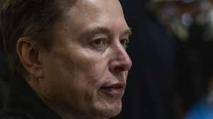 epa12023456 Elon Musk, CEO of Tesla and senior advisor to US President Donald Trump, looks on during a Cabinet meeting in the Cabinet Room of the White House in Washington, DC, USA, 10 April 2025.  EPA/SHAWN THEW / POOL